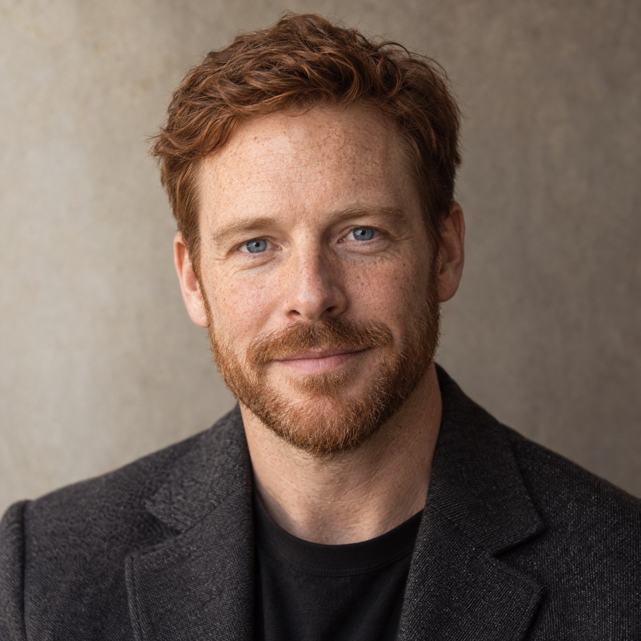 AI-generated photorealistic character portrait of Owen Kade, a fictional OMIKINA editorial persona.